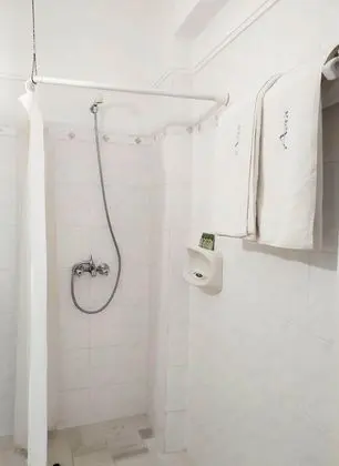 Üç Kişilik Oda, Bahçe Manzaralı