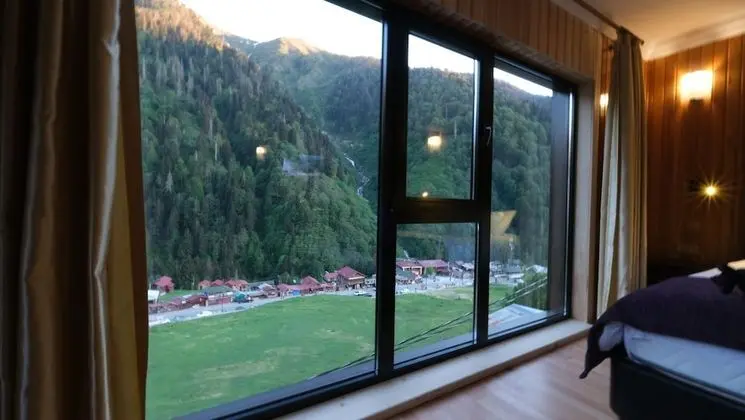 Deluxe, Fireplace, Waterfall View