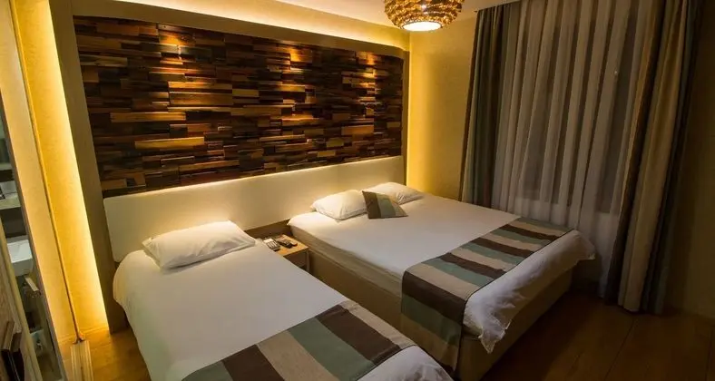 Deluxe  3 kisilik oda