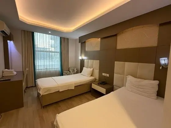 Standart Üç Kişilik Şehir manzarası Oda