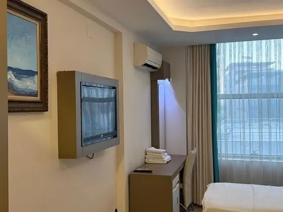 Standart Üç Kişilik Şehir manzarası Oda