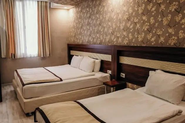 Deluxe Dört Kişilik Oda
