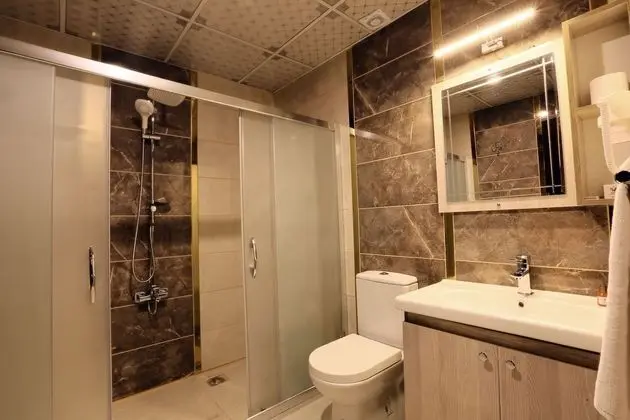 Deluxe Üç Kişilik Oda