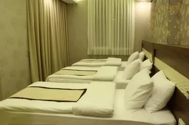 Deluxe Üç Kişilik Oda - İadesiz Oda Kahvaltı