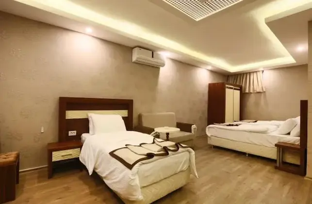 Deluxe Üç Kişilik Oda - İadesiz Oda Kahvaltı