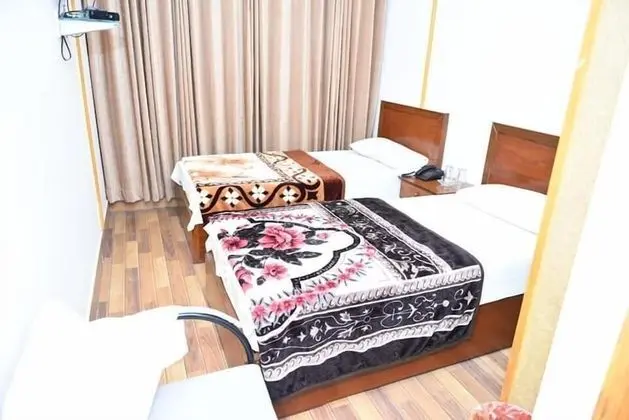 Deluxe Tek Büyük veya İki Ayrı Yataklı Oda