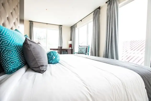 Luxury King Suite with Balcony and Town View