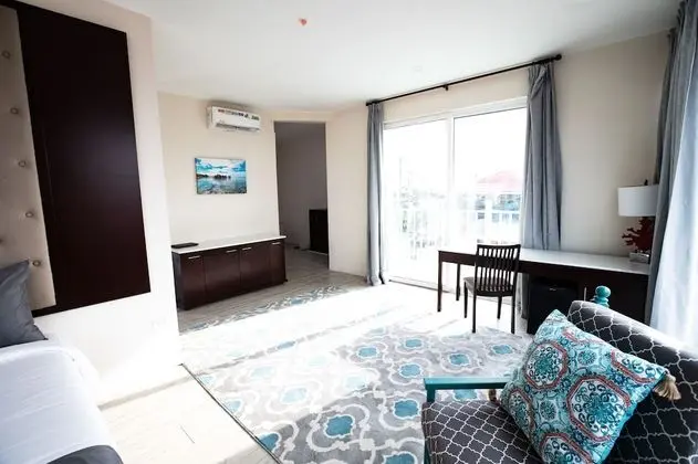 Luxury King Suite with Balcony and Town View