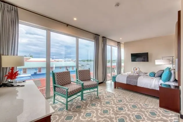 Luxury King Suite with Balcony and Town View