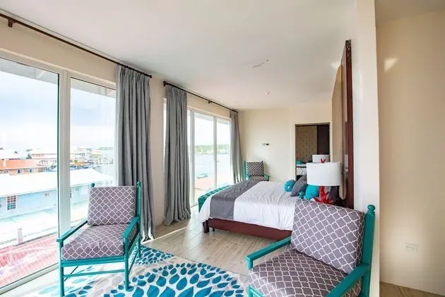 Luxury King Suite with Balcony and Town View