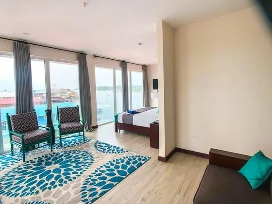 Luxury King Suite with Balcony and Town View
