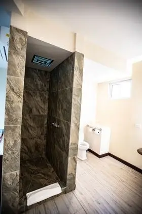 Luxury King Suite with Balcony and Town View