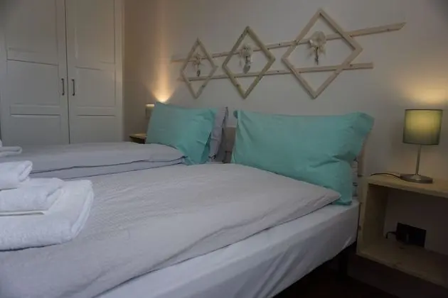 Tek Büyük veya İki Ayrı Yataklı Oda, Ortak Banyo (Acquamarina)