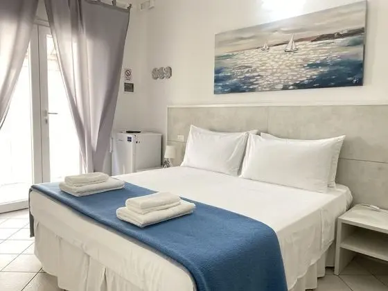 Basic Tek Büyük veya İki Ayrı Yataklı Oda