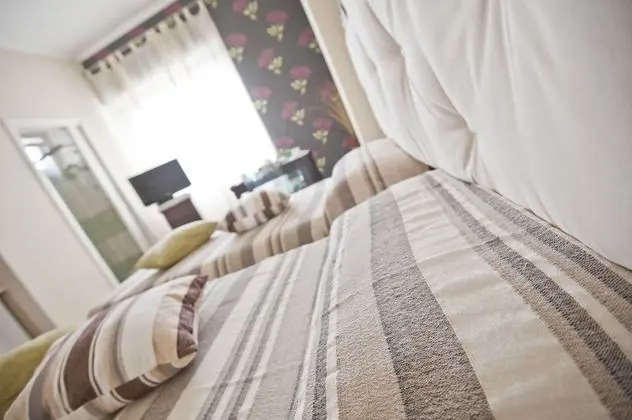 Deluxe Tek Büyük veya İki Ayrı Yataklı Oda