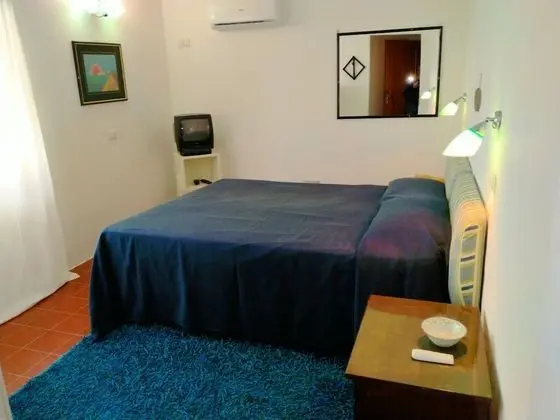 Tek Büyük veya İki Ayrı Yataklı Oda (Verde)