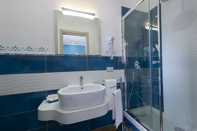 Deluxe Tek Büyük veya İki Ayrı Yataklı Oda (Rosa Blu)