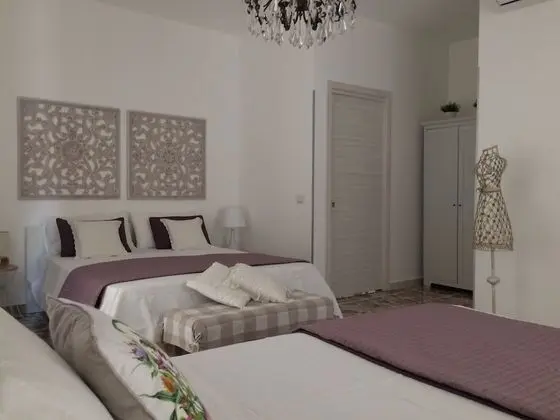 Deluxe Üç Kişilik Oda (Rosa)