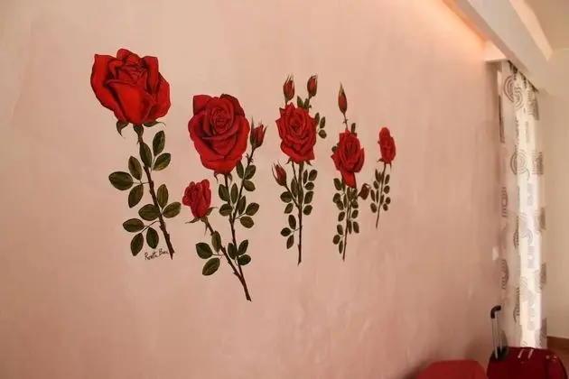 Deluxe Dört Kişilik Oda, Bahçe Manzaralı