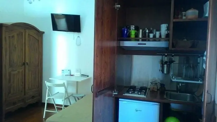 Comfort Tek Büyük veya İki Ayrı Yataklı Oda, Küçük Mutfak, Avlu Manzaralı (Civetta)