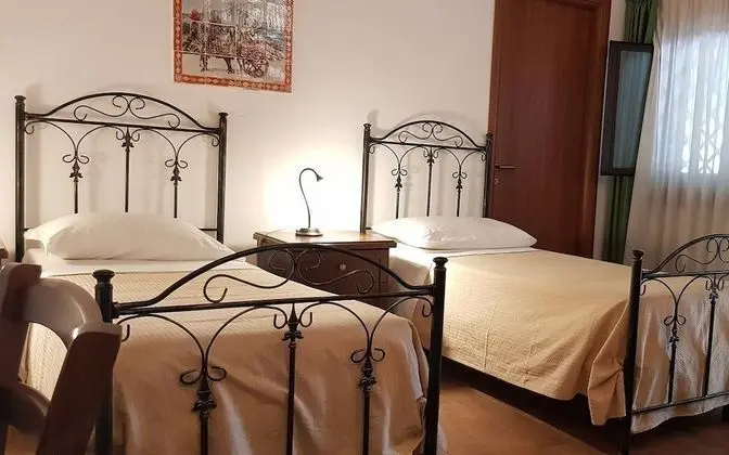 Deluxe Tek Büyük veya İki Ayrı Yataklı Oda