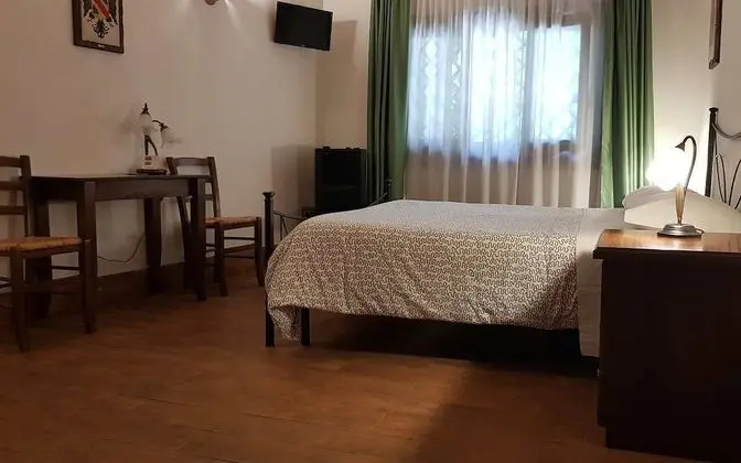 Deluxe Tek Büyük veya İki Ayrı Yataklı Oda