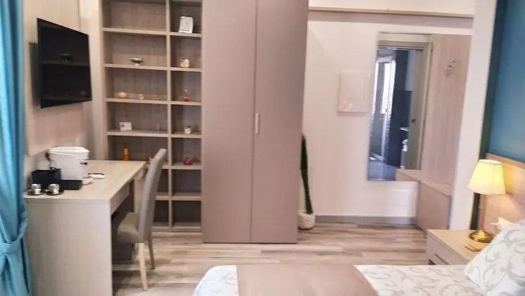 Deluxe Tek Büyük Yataklı Oda, Kısmi Deniz Manzaralı