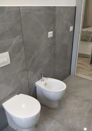 Deluxe Tek Büyük Yataklı Oda, Kısmi Deniz Manzaralı