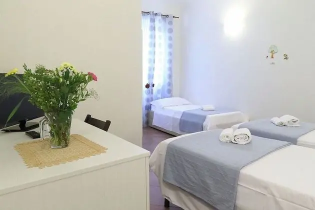Üç Kişilik Oda