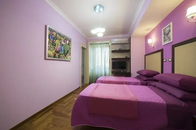 Deluxe Tek Büyük veya İki Ayrı Yataklı Oda