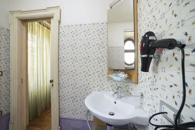 Deluxe Tek Büyük veya İki Ayrı Yataklı Oda