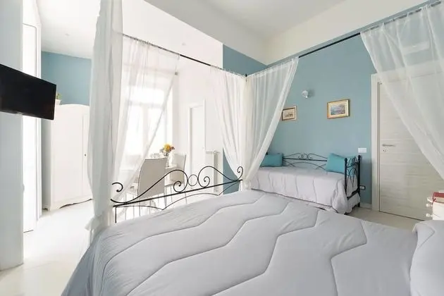 Deluxe Dört Kişilik Oda, Balkon, Şehir Manzaralı (Porta Capuana)