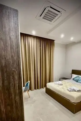 Deluxe Tek Büyük Yataklı Oda, 1 Çift Kişilik Yatak, Özel Banyo, Şehir Manzaralı