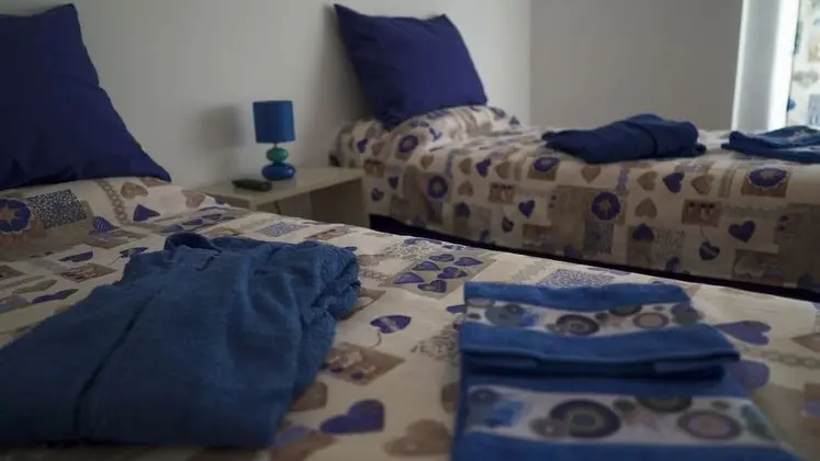 Deluxe Tek Büyük veya İki Ayrı Yataklı Oda (Blu)