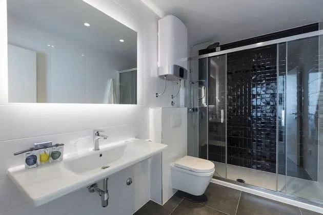 Deluxe Tek Büyük veya İki Ayrı Yataklı Oda