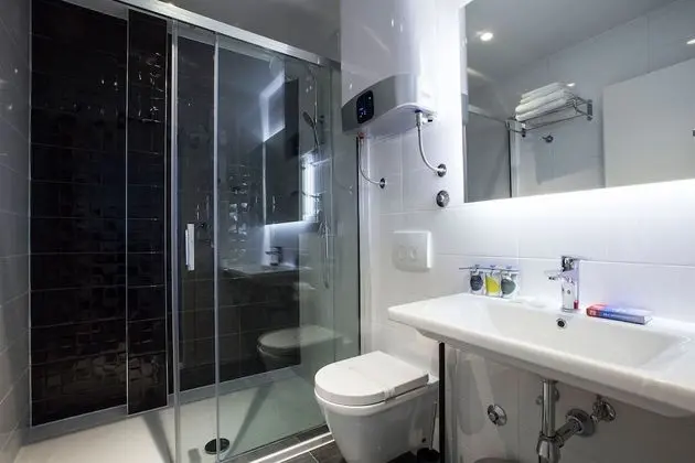 Deluxe Tek Büyük veya İki Ayrı Yataklı Oda