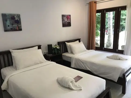 Deluxe Tek Büyük veya İki Ayrı Yataklı Oda