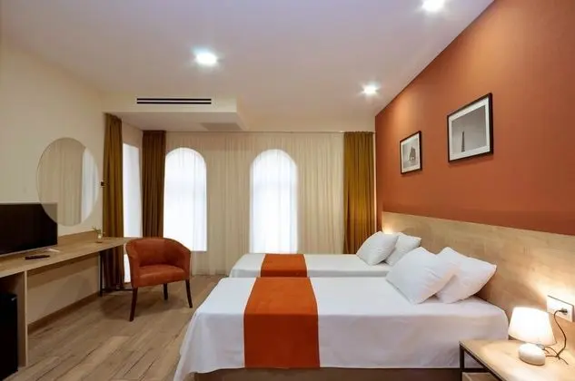 Deluxe Tek Büyük veya İki Ayrı Yataklı Oda