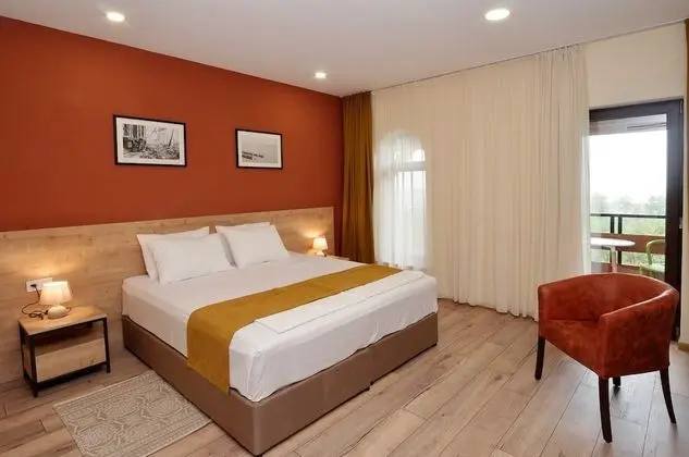 Deluxe Tek Büyük veya İki Ayrı Yataklı Oda
