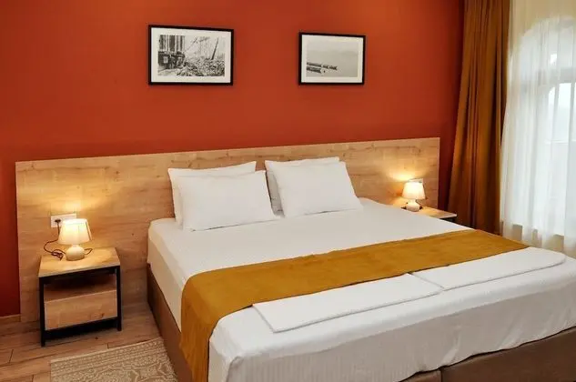 Deluxe Tek Büyük veya İki Ayrı Yataklı Oda