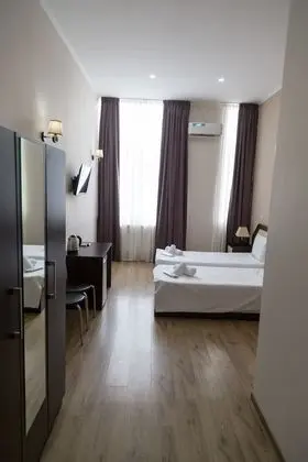 Basic Tek Büyük veya İki Ayrı Yataklı Oda