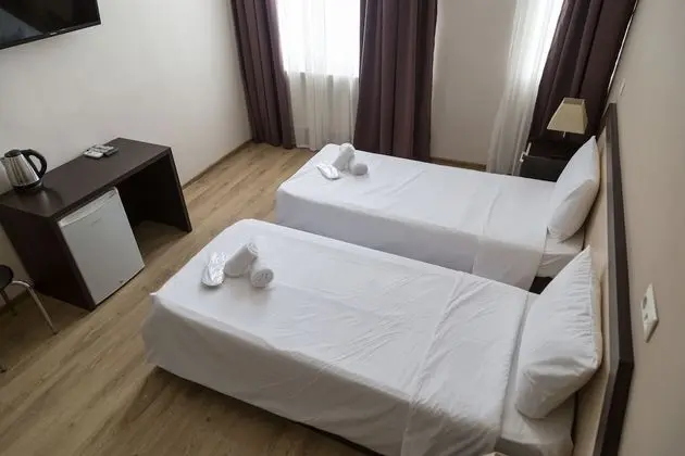 Basic Tek Büyük veya İki Ayrı Yataklı Oda