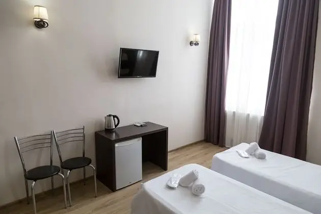 Basic Tek Büyük veya İki Ayrı Yataklı Oda