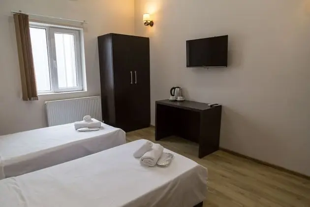 Basic Tek Büyük veya İki Ayrı Yataklı Oda