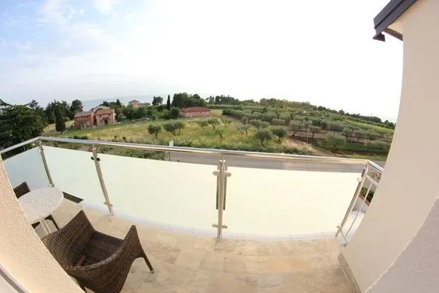 Superior Tek Büyük Yataklı Oda, Balkon, Kısmi Deniz Manzaralı