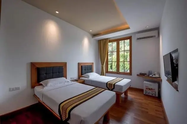 Deluxe Tek Büyük veya İki Ayrı Yataklı Oda