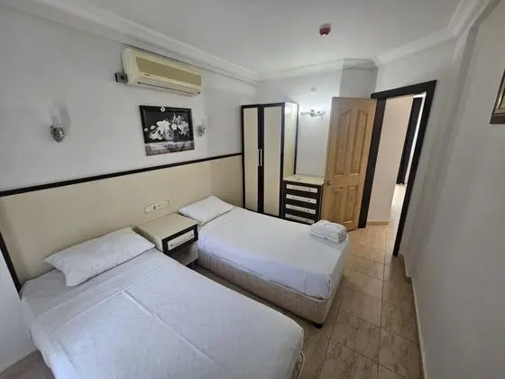 Üç Kişilik Oda,Havuz Manzaralı,Balkonlu