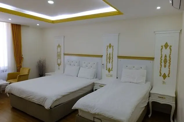 Üç Kişilik Oda