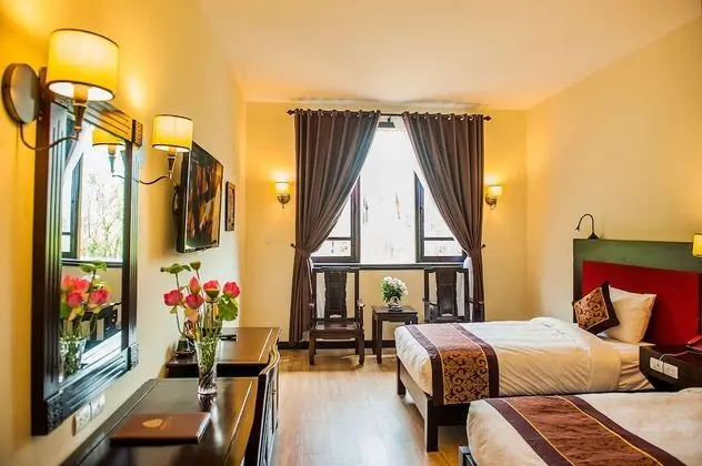 Deluxe Tek Büyük veya İki Ayrı Yataklı Oda