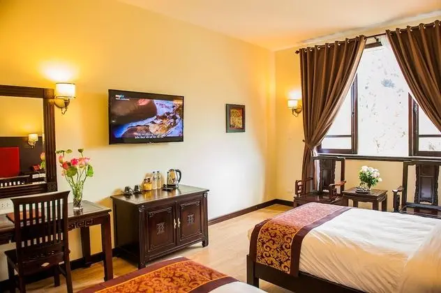 Deluxe Tek Büyük veya İki Ayrı Yataklı Oda